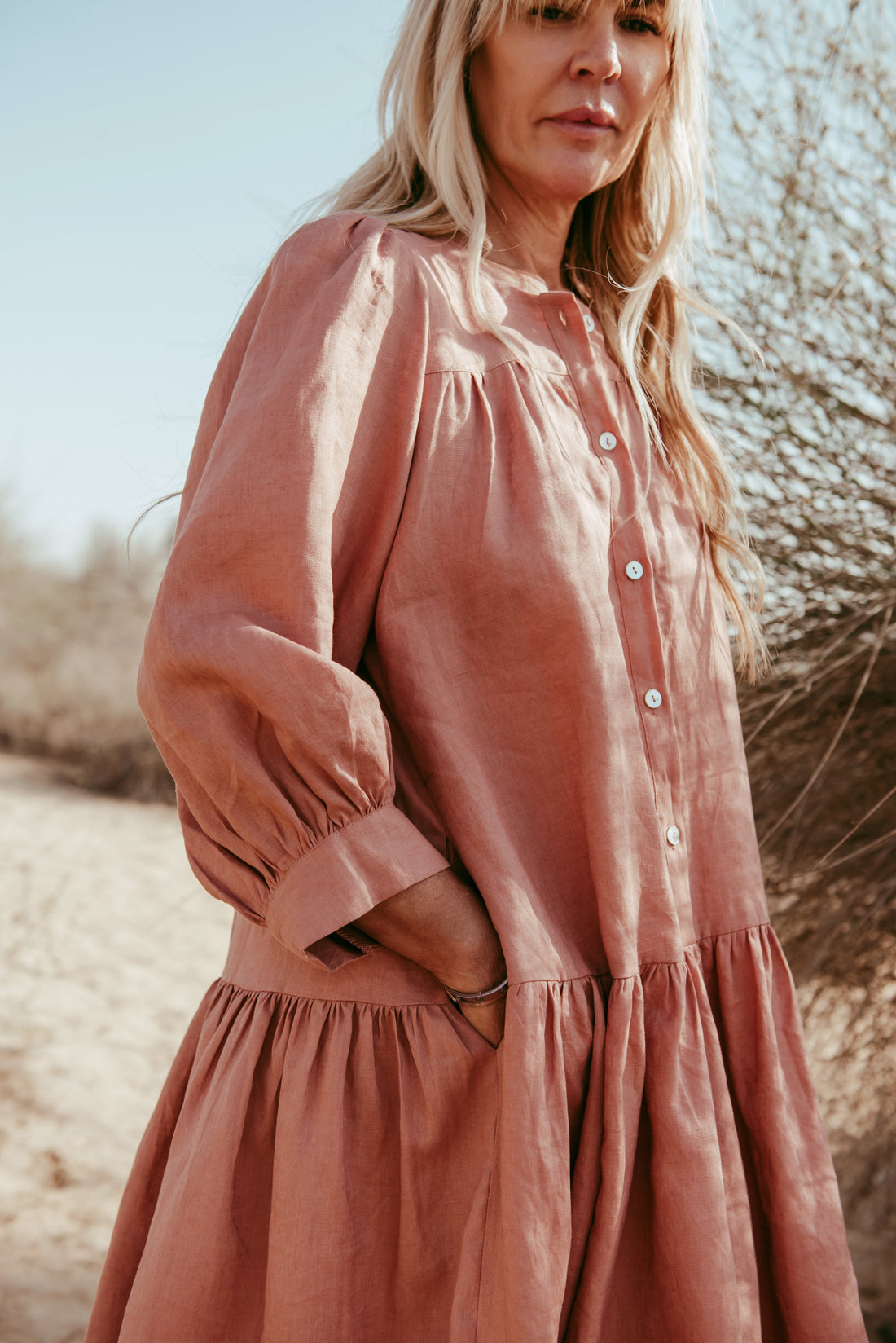 Designed and made in our Dubai studio. Delivered to your doorstep in 4 working days.

This puff-sleeved frill dress is inspired by our first collection. This ageless, timeless piece is handcrafted in linen to give you a cool, breathable, flowy experience. 

Thoughtfully designed as part of our commitment to sustainable fashion and the values of modern ethical fashion brands, combining timeless style with responsible craftsmanship.