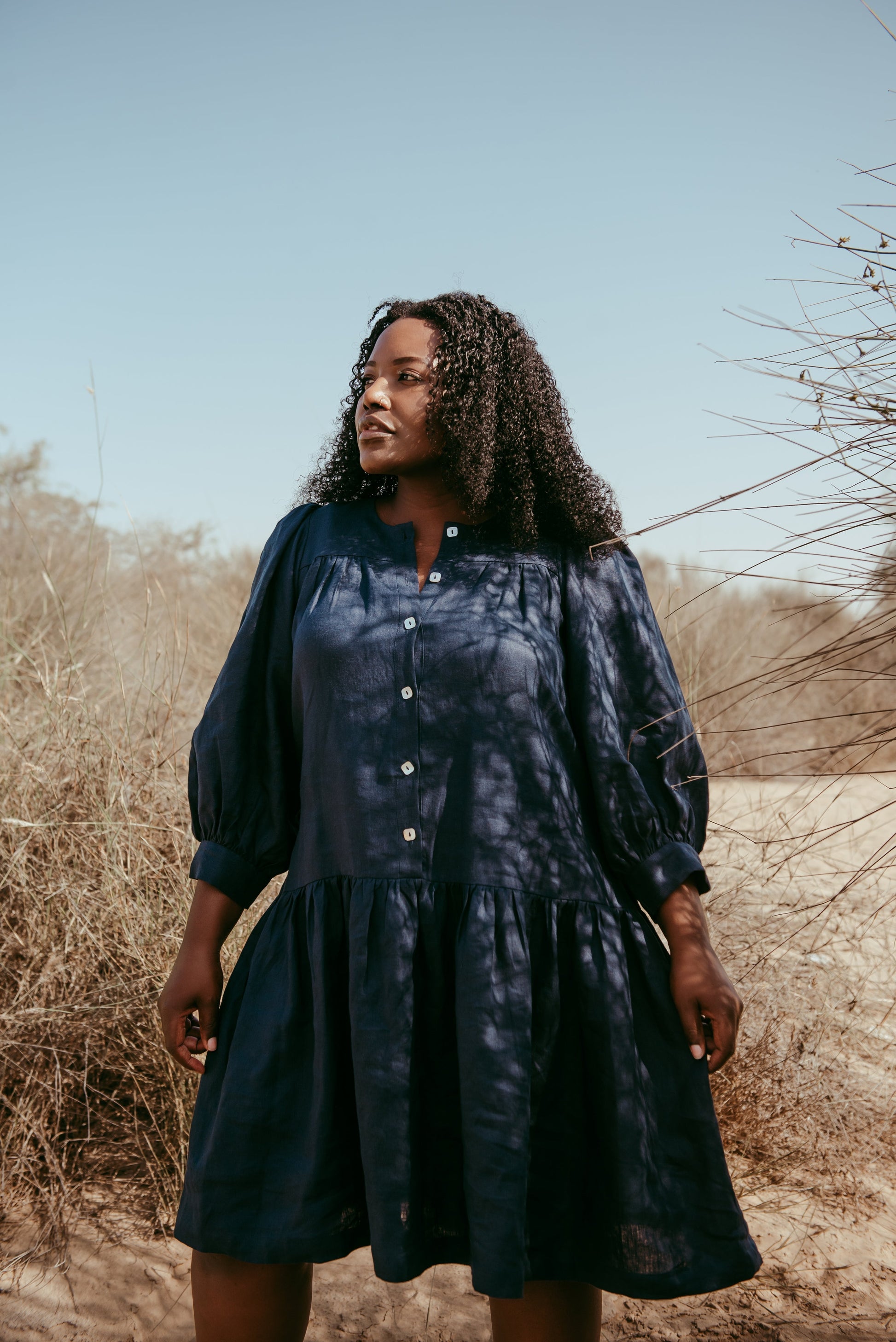 Designed and made in our Dubai studio. Delivered to your doorstep in 4 working days.

This puff-sleeved frill dress is inspired by our first collection. This ageless, timeless piece is handcrafted in linen to give you a cool, breathable, flowy experience. 

Thoughtfully designed as part of our commitment to sustainable fashion and the values of modern ethical fashion brands, combining timeless style with responsible craftsmanship.