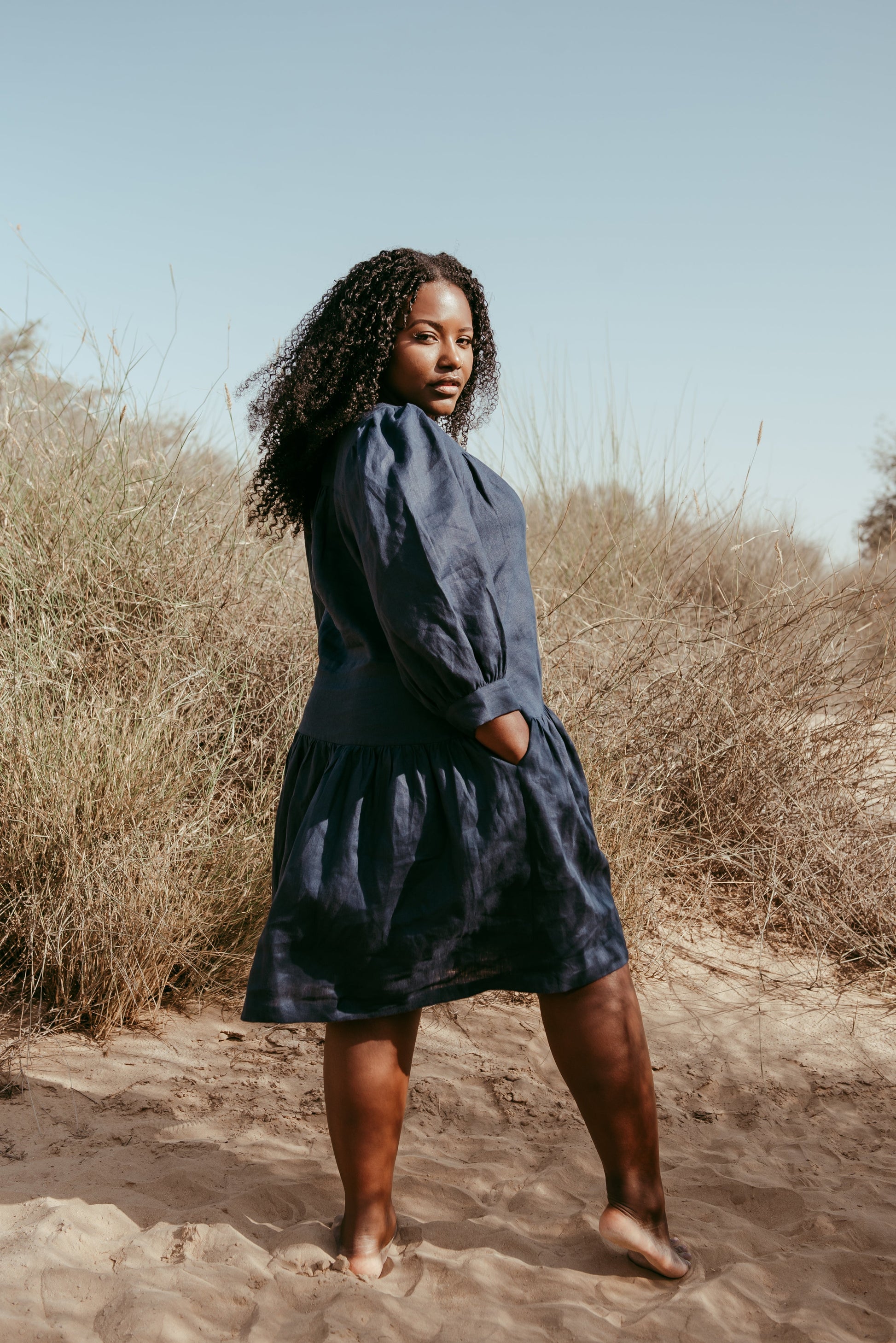 Designed and made in our Dubai studio. Delivered to your doorstep in 4 working days.

This puff-sleeved frill dress is inspired by our first collection. This ageless, timeless piece is handcrafted in linen to give you a cool, breathable, flowy experience. 

Thoughtfully designed as part of our commitment to sustainable fashion and the values of modern ethical fashion brands, combining timeless style with responsible craftsmanship.