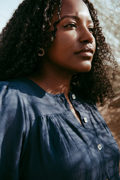 Neck detail of the Woman wearing Aabha Italian linen dress in Navy Blue