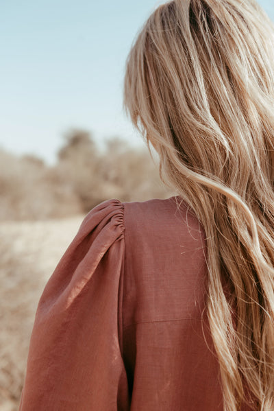 Back detail of Aabha Italian linen dress in Brick Brown with puff sleeves