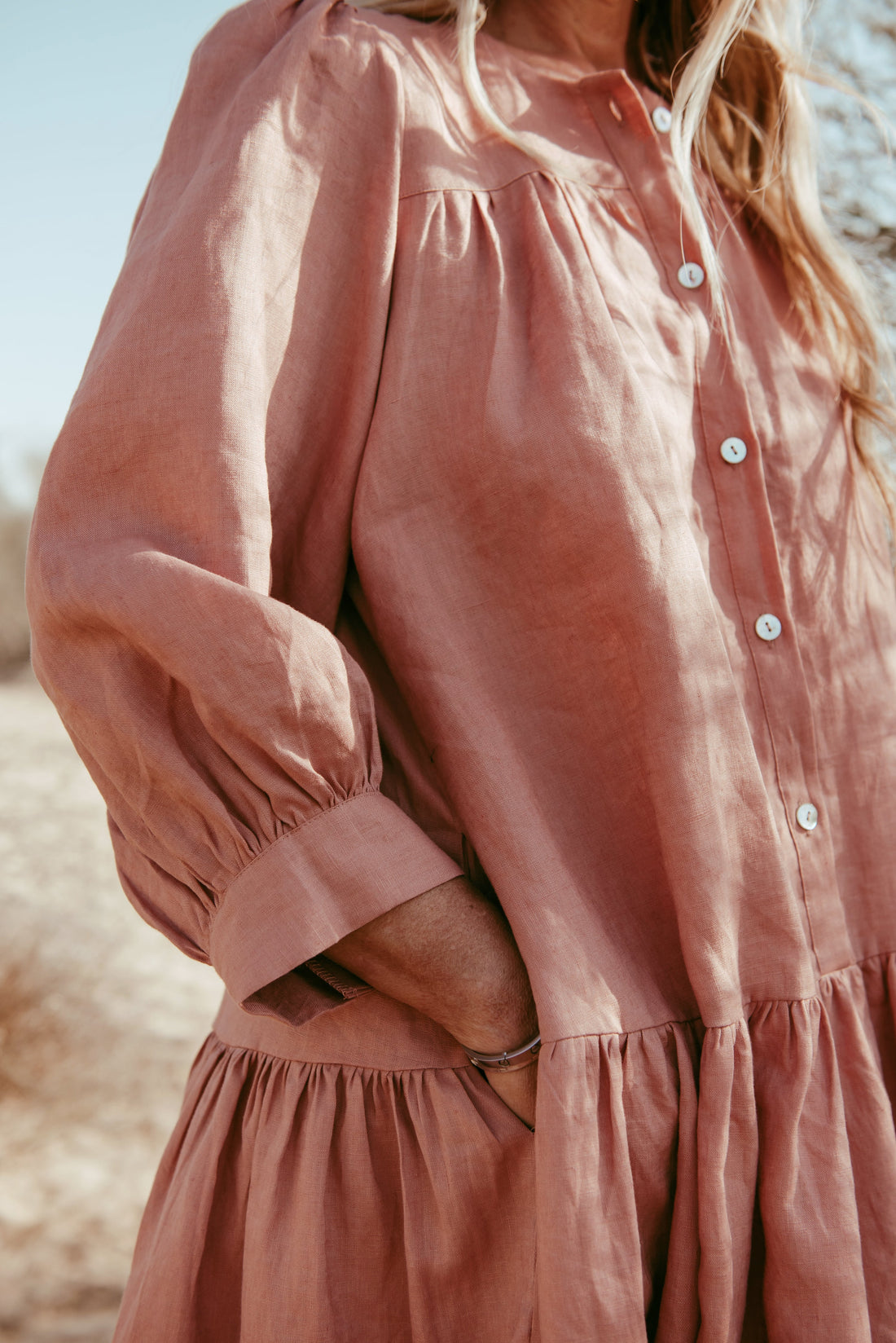 Designed and made in our Dubai studio. Delivered to your doorstep in 4 working days.

This puff-sleeved frill dress is inspired by our first collection. This ageless, timeless piece is handcrafted in linen to give you a cool, breathable, flowy experience. 

Thoughtfully designed as part of our commitment to sustainable fashion and the values of modern ethical fashion brands, combining timeless style with responsible craftsmanship.