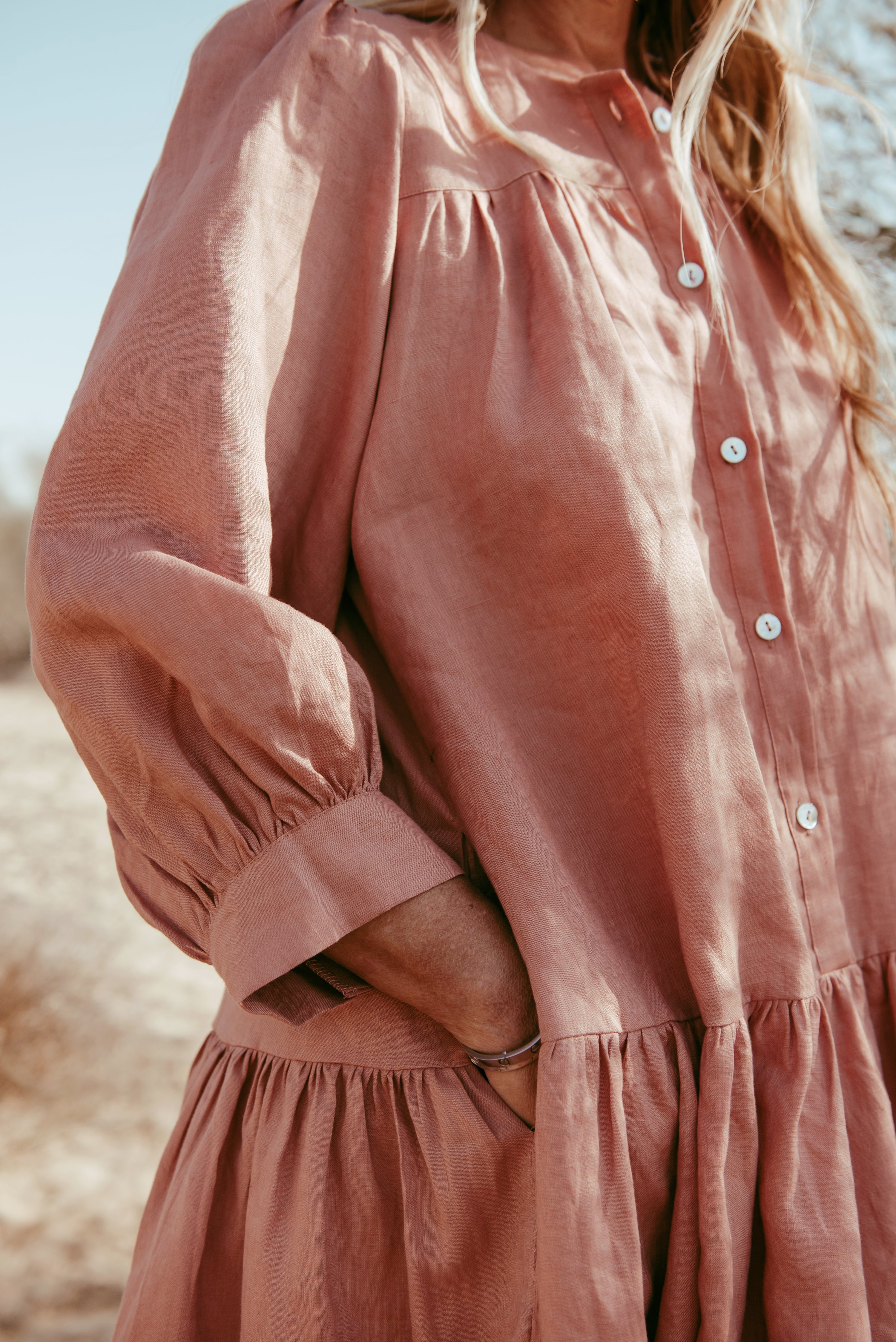 Designed and made in our Dubai studio. Delivered to your doorstep in 4 working days.

This puff-sleeved frill dress is inspired by our first collection. This ageless, timeless piece is handcrafted in linen to give you a cool, breathable, flowy experience. 

Thoughtfully designed as part of our commitment to sustainable fashion and the values of modern ethical fashion brands, combining timeless style with responsible craftsmanship.