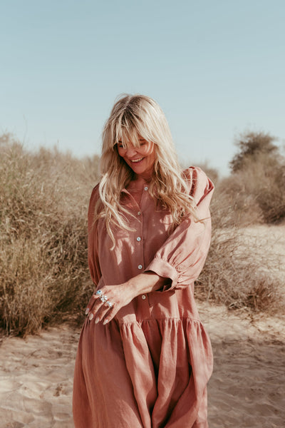 Aabha Brick Brown Italian linen dress styled for resort wear