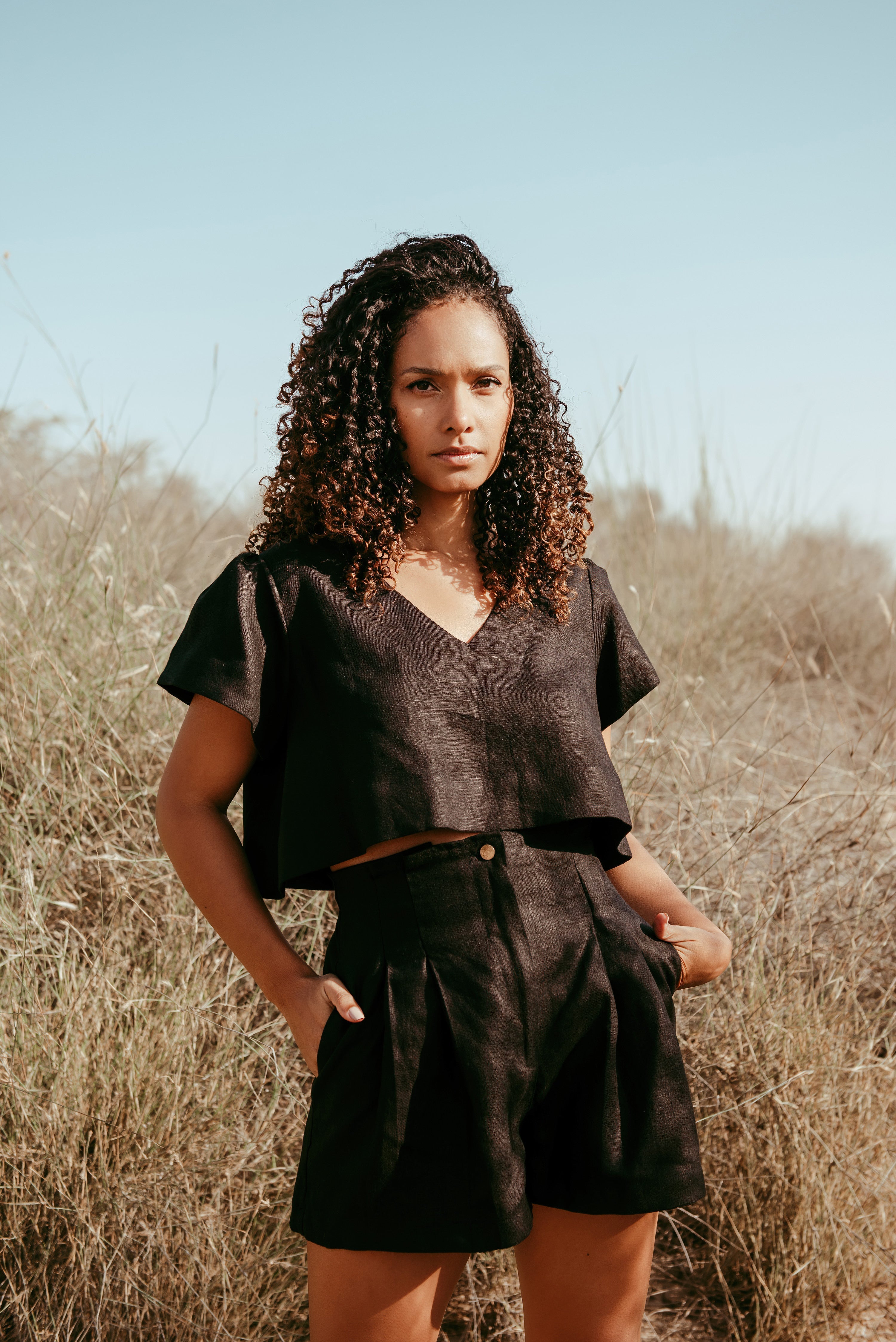 Pleated high-waisted Italian linen shorts. Made in Dubai. Sustainable fashion. Slow Fashion.