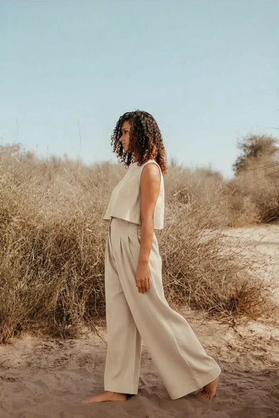 Woman wearing Amelia sleeveless Italian linen co-ord set in Off-White