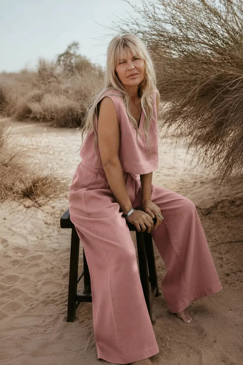 Designed and made in our Dubai studio. Pleated High-waisted Pants + Sleeveless Crop Top. Thoughtfully designed as part of our commitment to sustainable fashion and the values of modern ethical fashion brands, combining timeless style with responsible craftsmanship.
