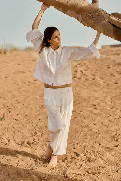 Designed and made in our Dubai studio. Pleated Low-waisted Organic Cotton Poplin Pants + Crop Full Sleeve Shirt . sustainable fashion . Ethical fashion brands.