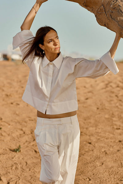 Designed and made in our Dubai studio. Pleated Low-waisted Organic Cotton Poplin Pants + Crop Full Sleeve Shirt . sustainable fashion . Ethical fashion brands.