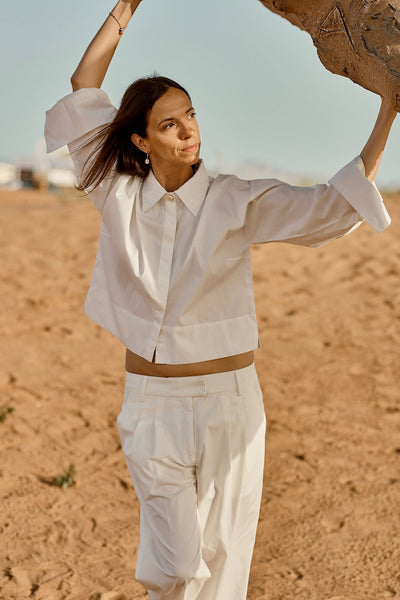 Designed and made in our Dubai studio. Pleated Low-waisted Organic Cotton Poplin Pants + Crop Full Sleeve Shirt . sustainable fashion . Ethical fashion brands.