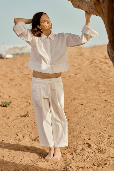 Designed and made in our Dubai studio. Pleated Low-waisted Organic Cotton Poplin Pants + Crop Full Sleeve Shirt . sustainable fashion . Ethical fashion brands.