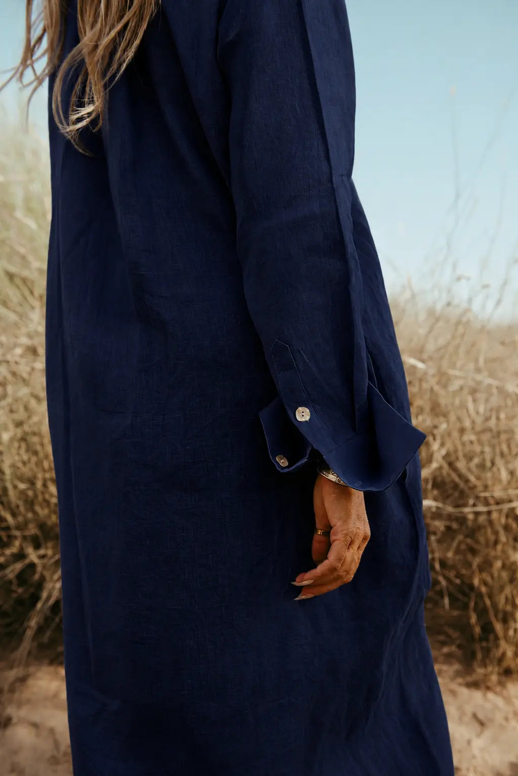 Designed and made in our Dubai studio.  Choker collar dress for a day at the beach or dress it up with a belt. Made out of pure natural Italian linen. Sustainable fashion. Slow Fashion brand.