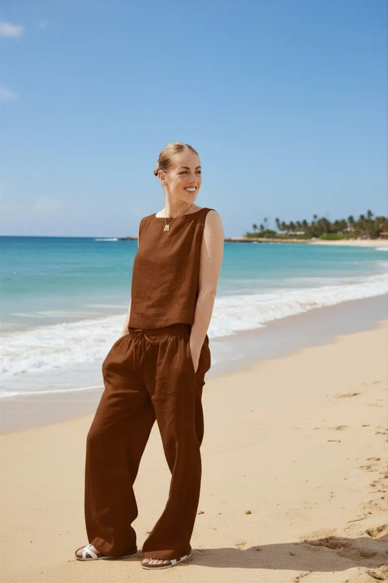 Dahlia Pants set is crafted from Italian linen and features an elasticated waist with drawstrings. Sustainably U. Brown