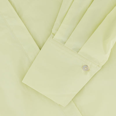 Close-up of Isla organic cotton shirt cuff and sleeve detail