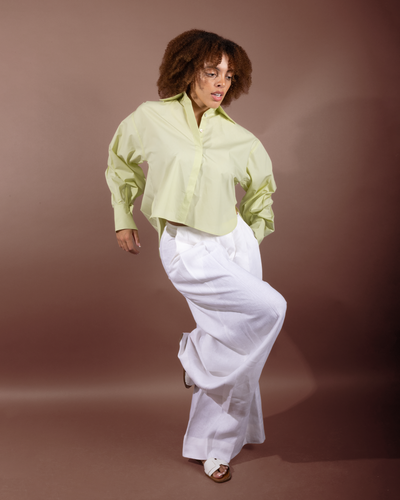 Woman wearing Isla GOTS organic cotton shirt by Sustainably U