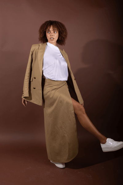Designed and made in our Dubai studio.Linen wrap skirt. sustainable fashion. Ethical fashion brands.