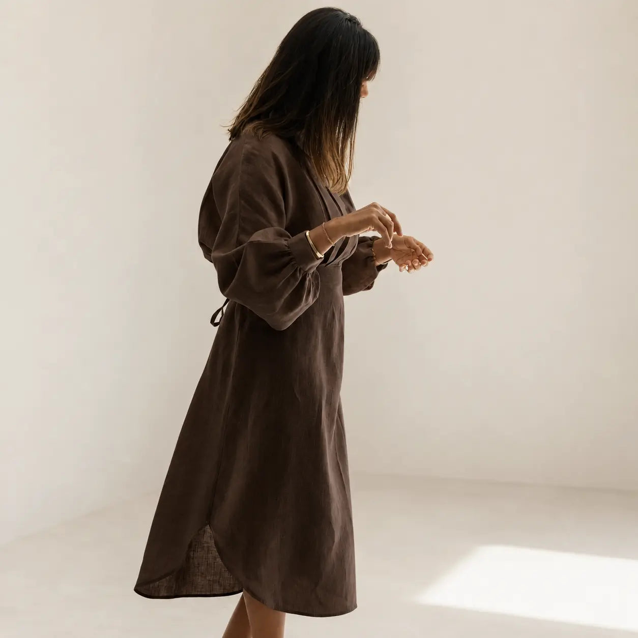 Shop the Sana lantern sleeve midi dress in 100% Italian linen. Handmade in Dubai