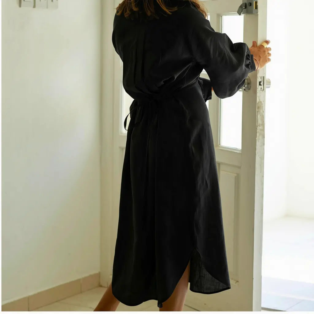 Shop the Sana lantern sleeve midi dress in 100% Italian linen. Handmade in Dubai