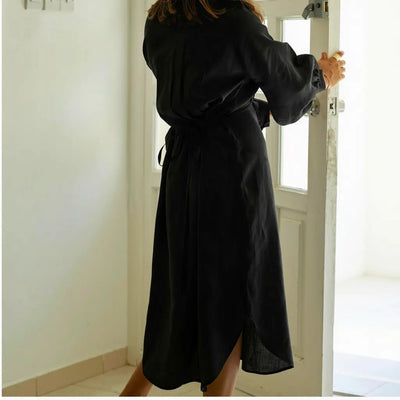 Shop the Black Sana lantern sleeve midi dress in 100% Italian linen. Handmade in Dubai