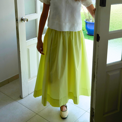 Shama GOTS organic cotton skirt in lemon yellow, full-length front view