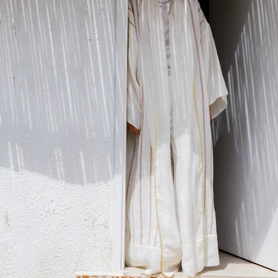 An oversized, floor-length shawl abaya crafted from premium Italian linen