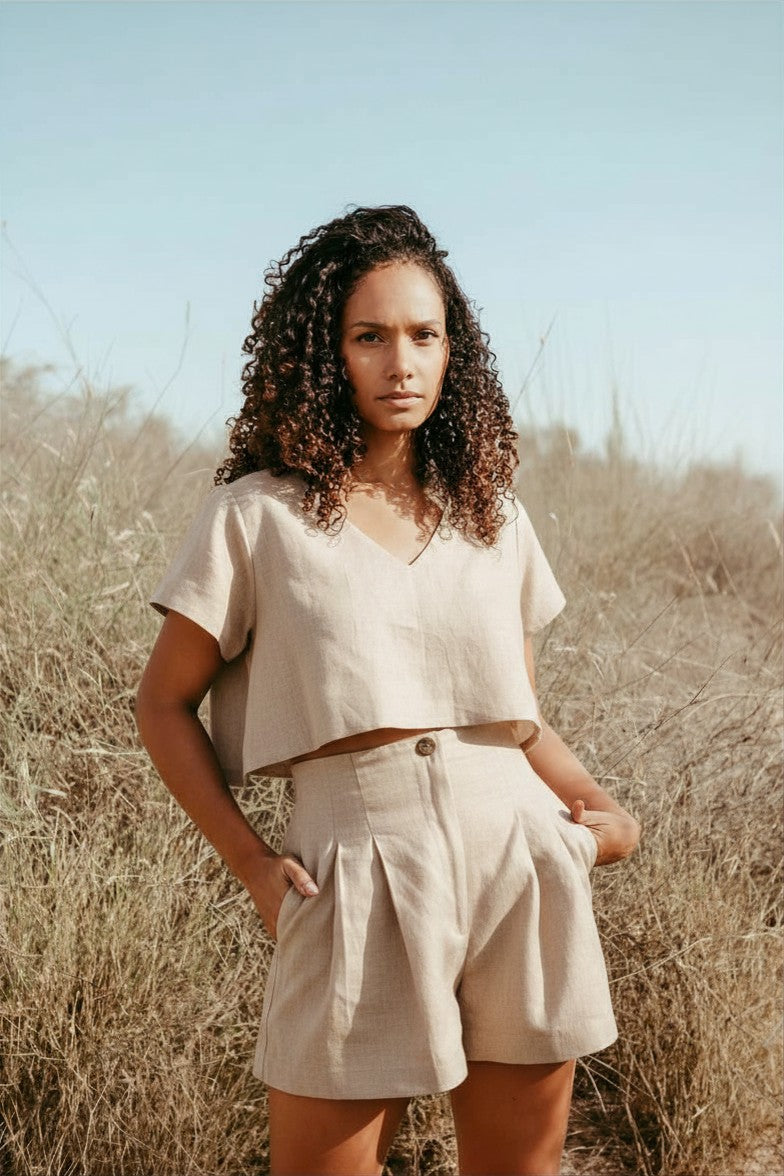Pleated high-waisted Italian linen shorts. Made in Dubai. Sustainable fashion. Slow Fashion. Beige