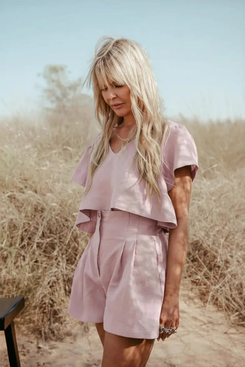 Pleated high-waisted Italian linen shorts set.