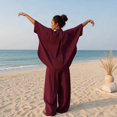Maroon women's linen co-ord set on Dubai beach
