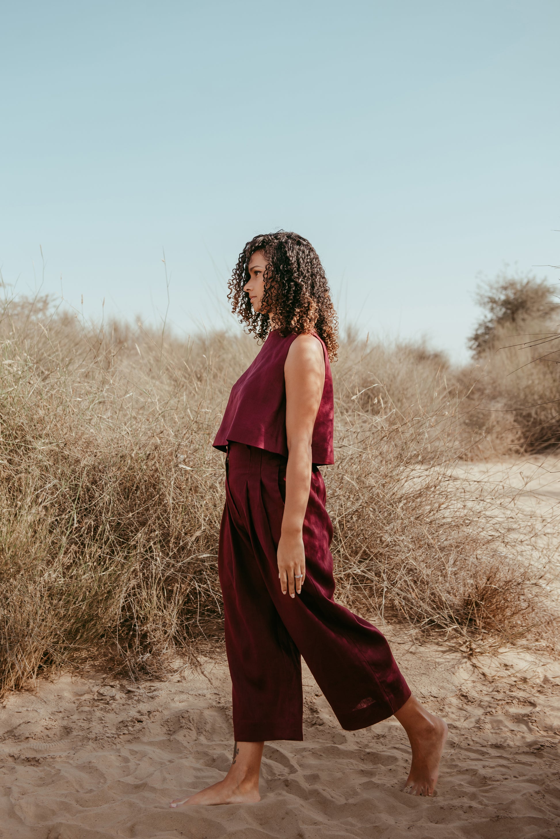 Designed and made in our Dubai studio. Pleated High-waisted Pants + Sleeveless Crop Top. Thoughtfully designed as part of our commitment to sustainable fashion and the values of modern ethical fashion brands, combining timeless style with responsible craftsmanship.