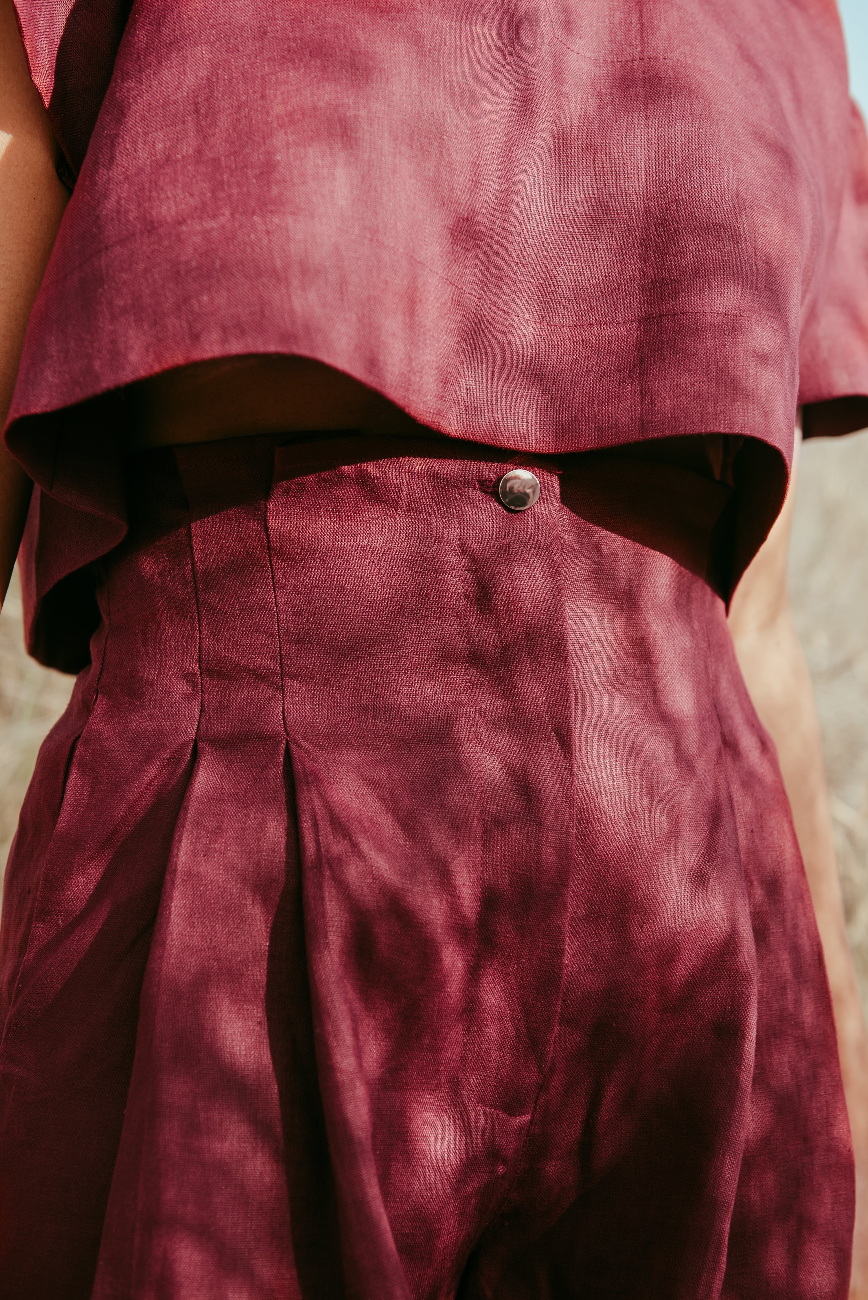 Designed and made in our Dubai studio. Pleated High-waisted Pants + Sleeveless Crop Top. Thoughtfully designed as part of our commitment to sustainable fashion and the values of modern ethical fashion brands, combining timeless style with responsible craftsmanship.