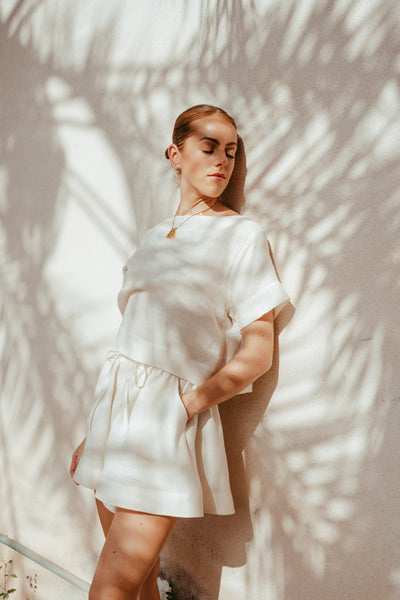Ume Italian linen shorts set in off-white full-length view
