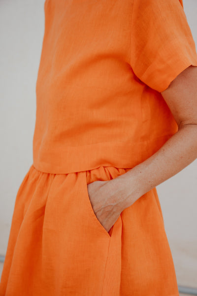 Ume orange Italian linen shorts set full-length lifestyle view