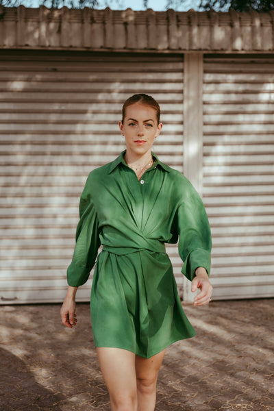 Woman wearing Maple green wrap dress showing relaxed silhouette
