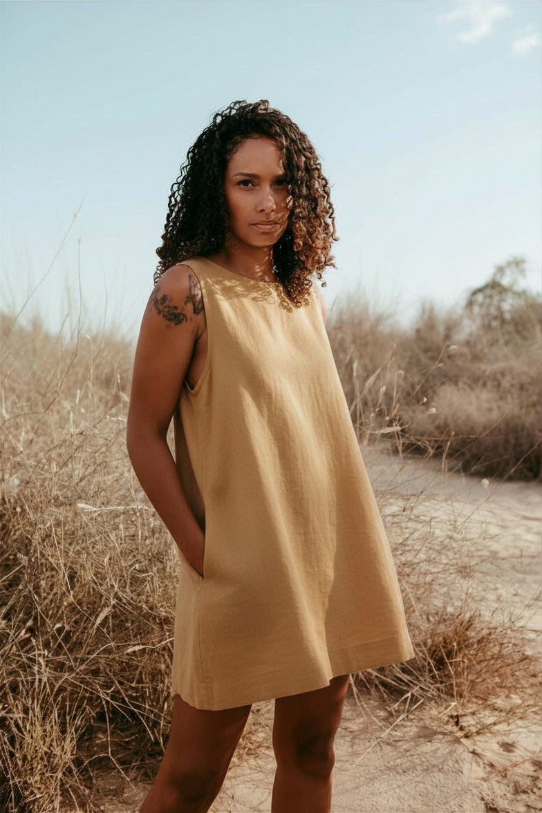 sleeveless Italian linen shift dress in beige. Made in Dubai. Sustainably U