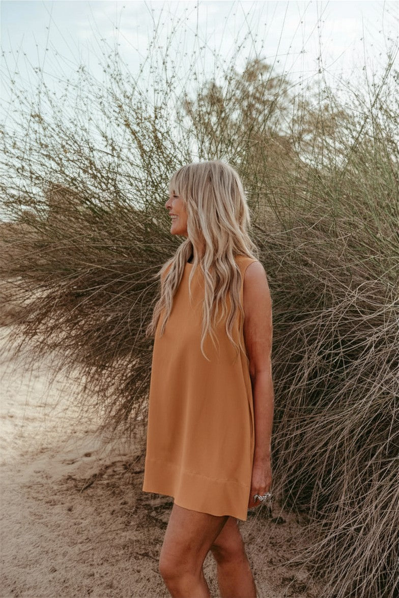 sleeveless Italian linen shift dress in beige. Made in Dubai. Sustainably U